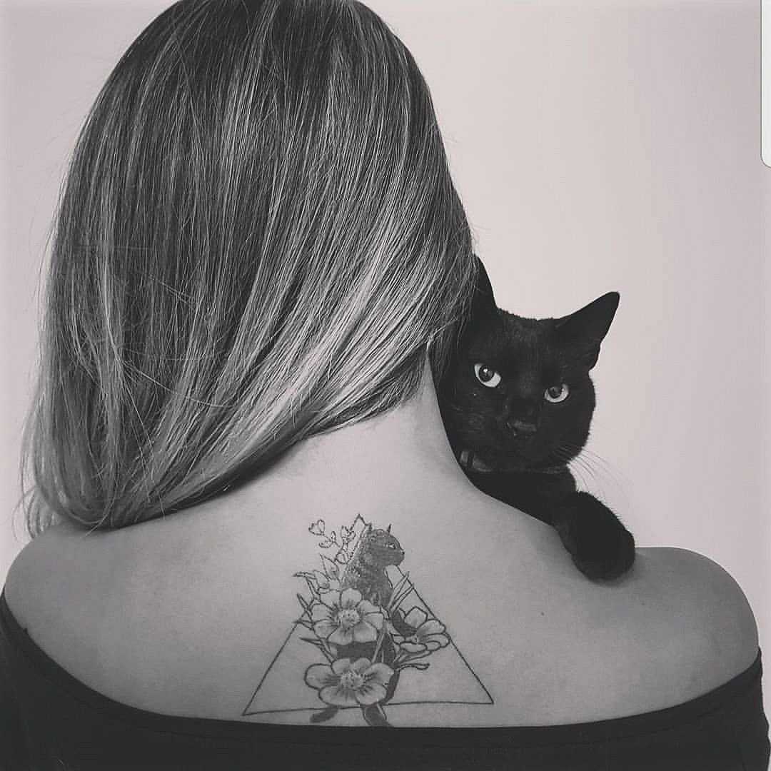 Значение татуировки кот в цилиндре. что означает татуировка кота на теле: история